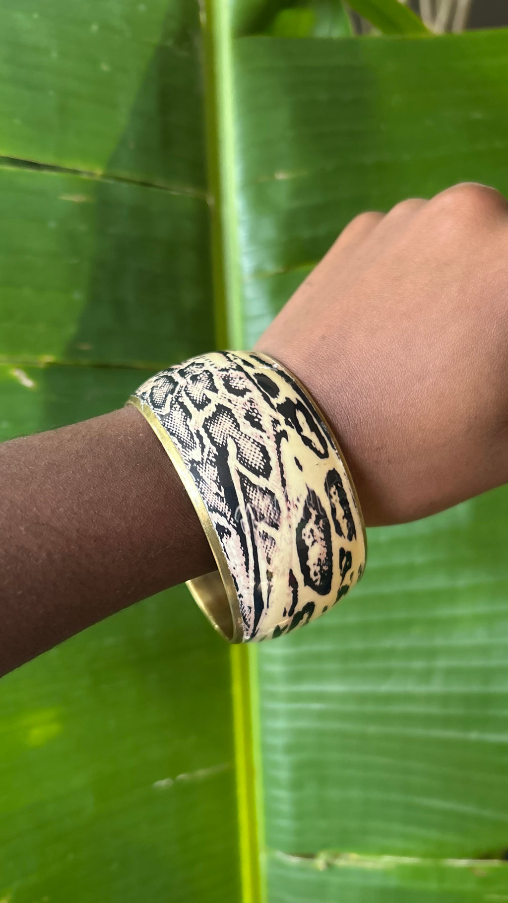 Snake print brass bangle