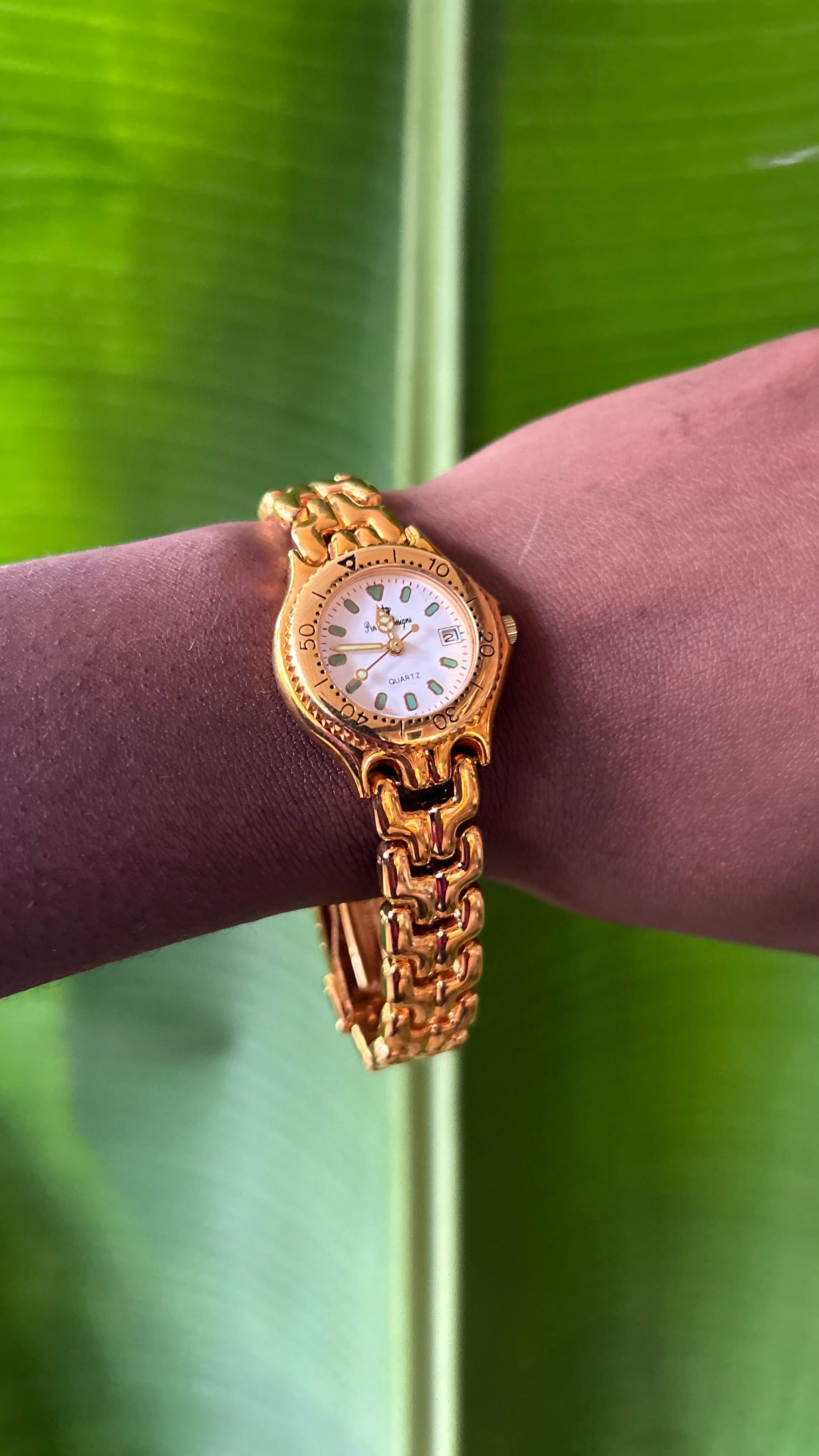 Premiere Designs gold watch