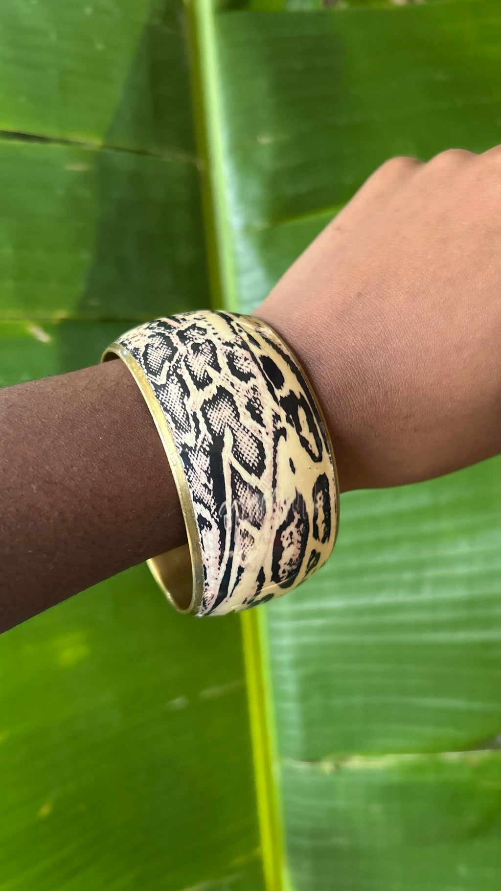 Snake print brass bangle